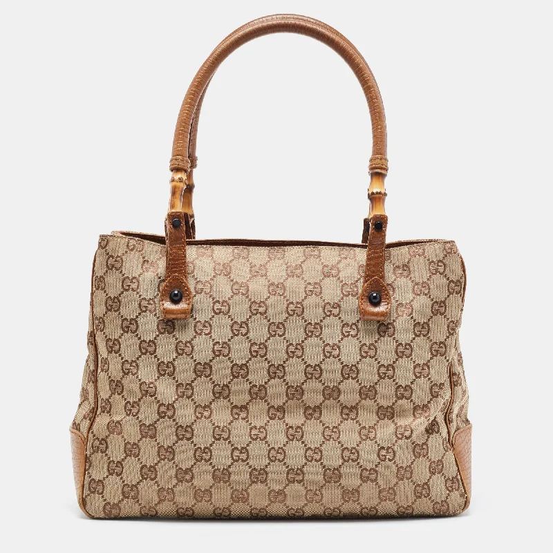 Handle bags with spacious pockets for travel -Gucci Brown/beige Gg Canvas And Leather Bamboo Tote