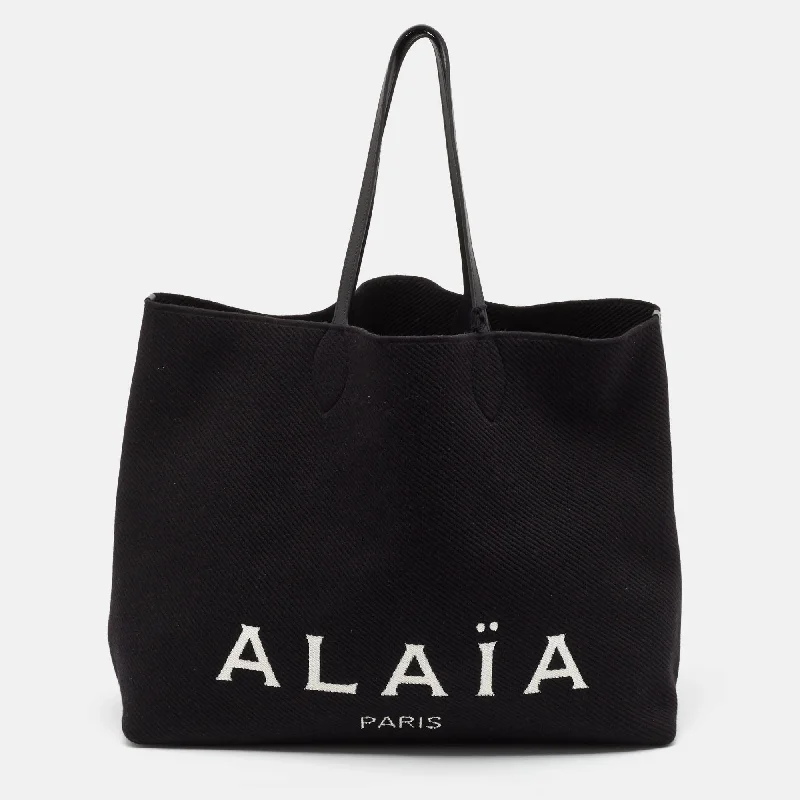 Handle bags with padded interiors for laptops -Alaia Black Knit Fabric Large Logo Tote