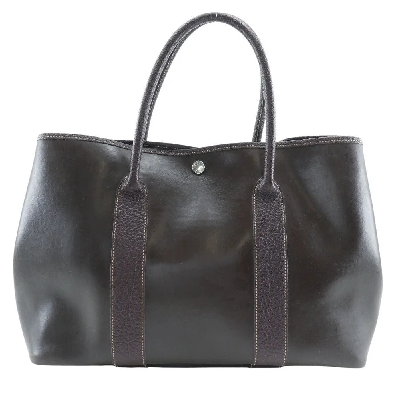 Handle bags with rugged canvas for outdoors -Hermès Garden Party  Leather Tote Bag (Pre-Owned)