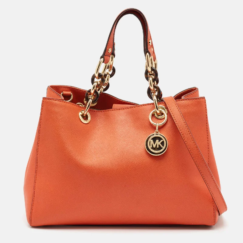 Handle bags with vintage clasps for nostalgia -Michael Kors Orange Leather Medium Cynthia Tote