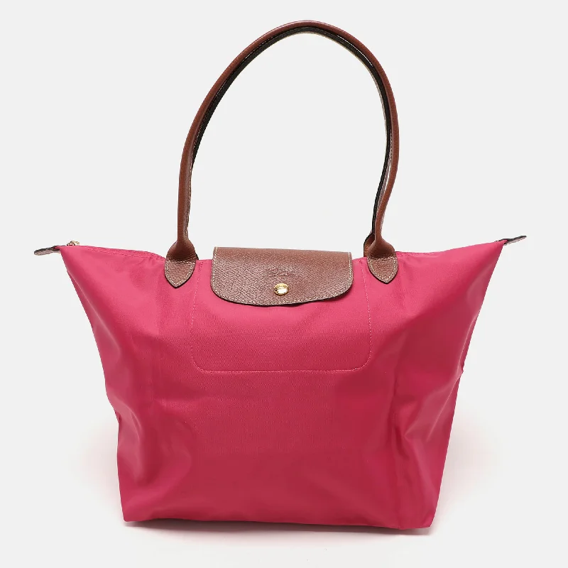 Handle bags with sleek hardware for sophistication -Longchamp Pink/brown Nylon And Leather Large Le Pliage Tote