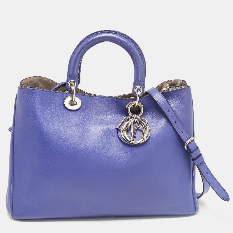 Handle bags with playful pom-poms for charm -Dior Purple Leather Large Diorissimo Shopper Tote