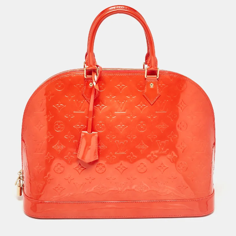 Handle bags with vibrant colors for boldness -Louis Vuitton Rouge Grenadine Monogram Vernis Alma Gm Bag