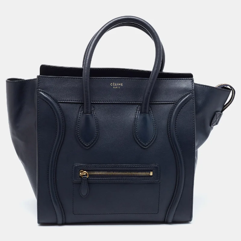 Handle bags with wide openings for access -Celine Navy Blue Leather Mini Luggage Tote