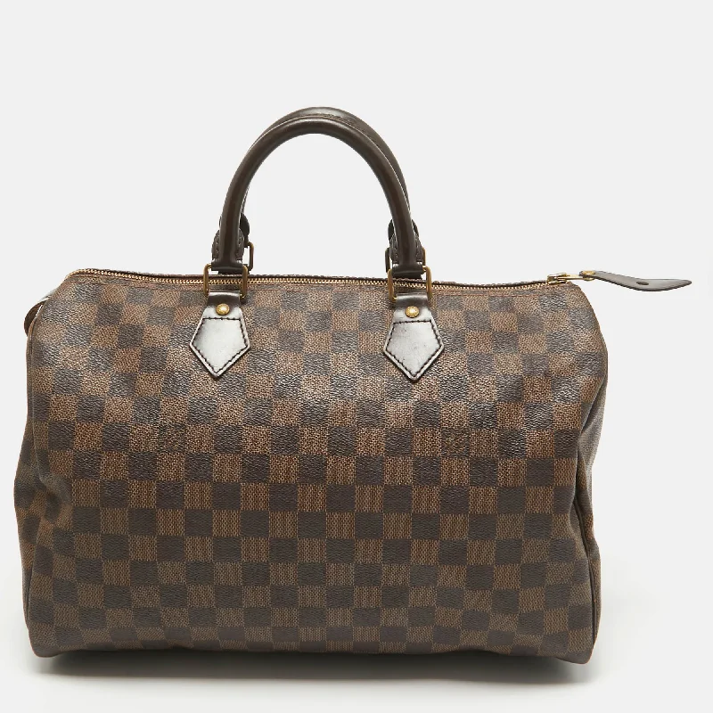 Handle bags with spacious interiors for storage -Louis Vuitton Damier Ebene Canvas Speedy 35 Bag