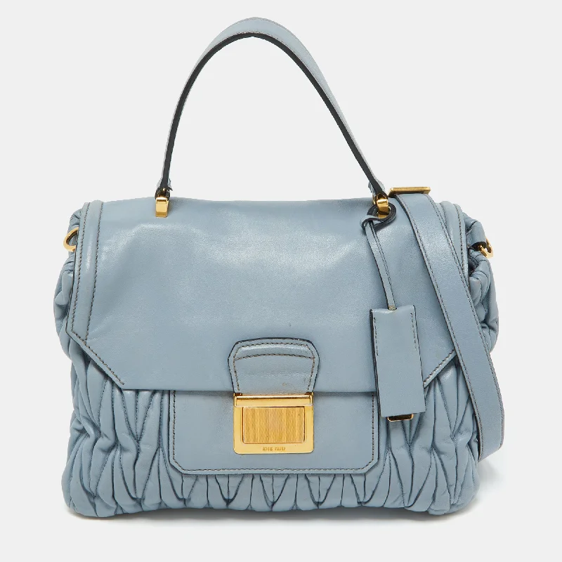 Handle bags with striped canvas for beach -Miu Miu Light Blue Leather Matelassé Flap Top Handle Bag