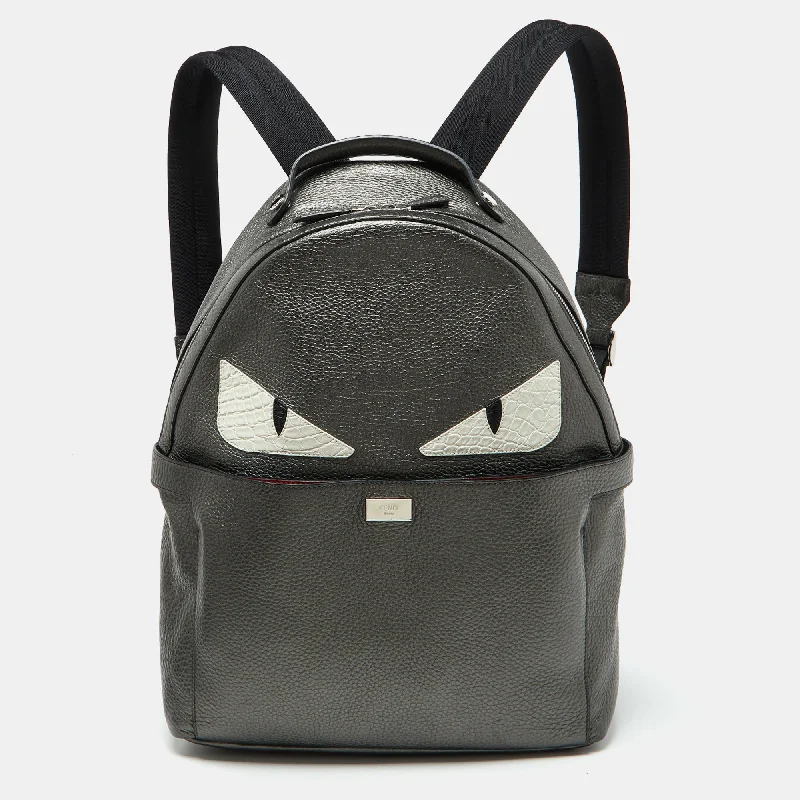 Handle bags with bright neons for visibility -Fendi Metallic Grey Leather Monster Eyes Rounded Backpack