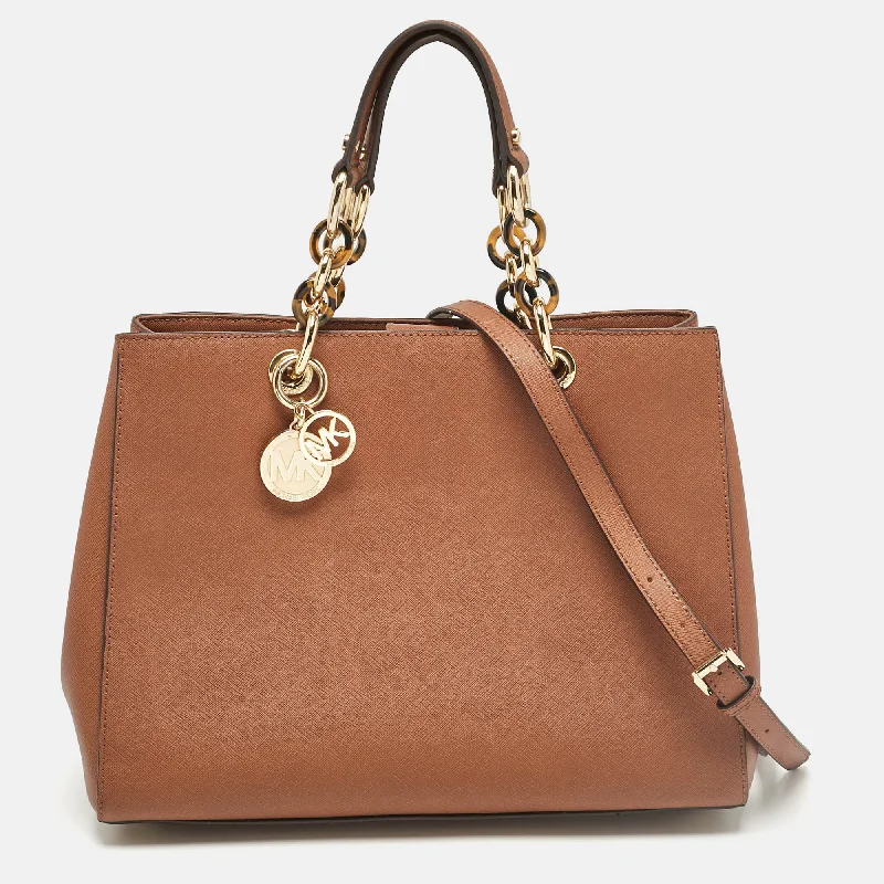 Handle bags with colorful handles for flair -Michael Kors Brown Leather Large Cynthia Tote