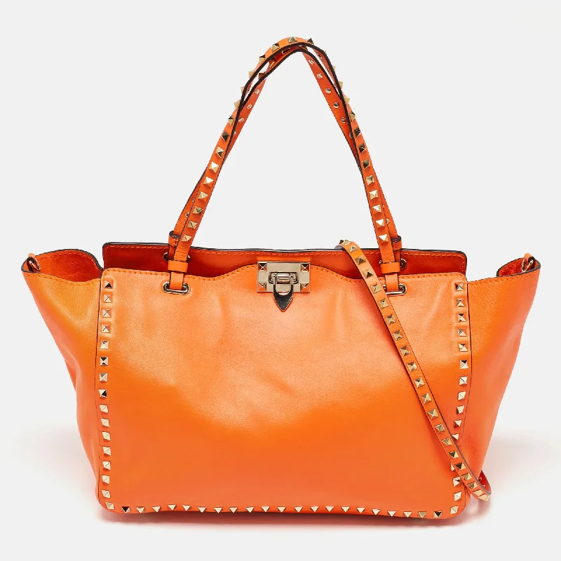 Handle bags with thick handles for support -Valentino Neon Orange Leather Medium Rockstud Trapeze Tote