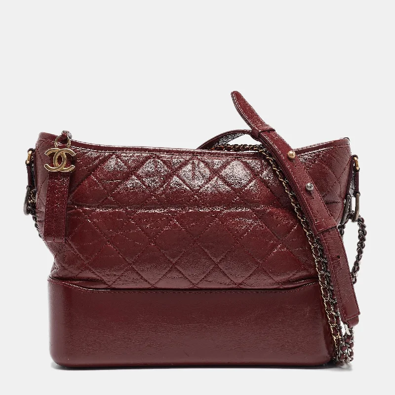 Handle bags with animal prints for flair -Chanel Red Quilted Leather Medium Gabrielle Hobo