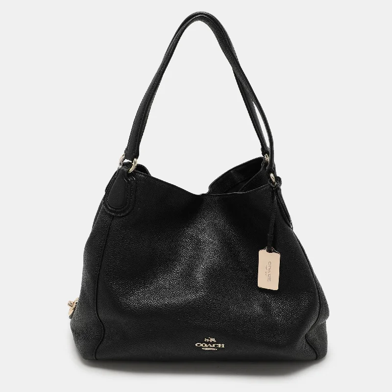 Handle bags with waterproof lining for protection -Coach Black Leather Edie 31 Satchel