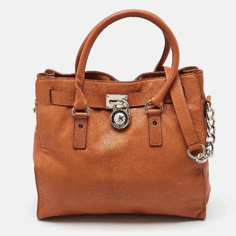 Handle bags with spacious interiors for storage -Michael Kors Brown Leather Large Hamilton North South Tote