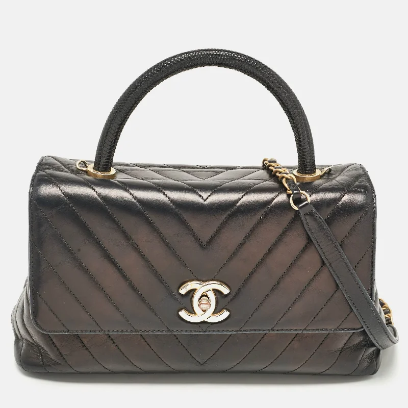 Handle bags with contrast stitching for detail -Chanel Black Chevron Leather Small Coco Top Handle Bag