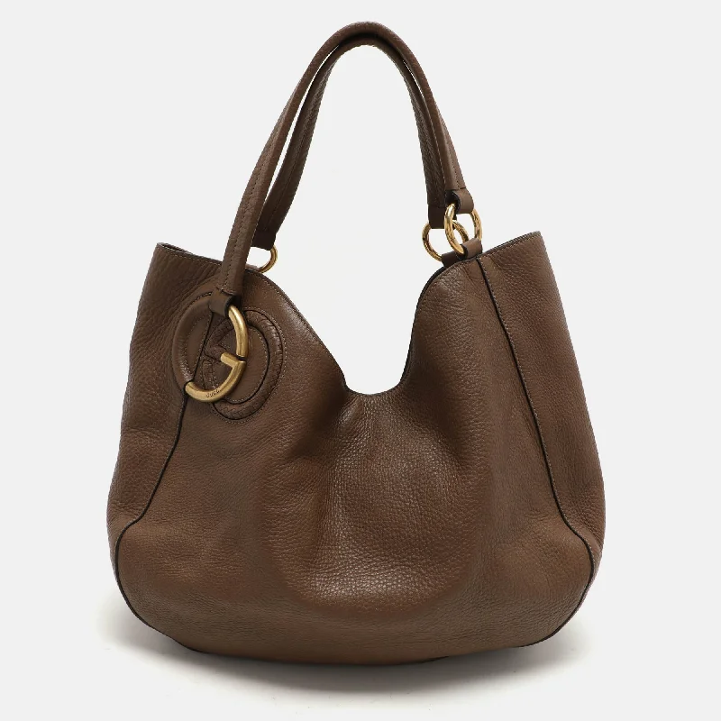 Handle bags with bold stripes for trendiness -Gucci Brown Leather Twill Tote