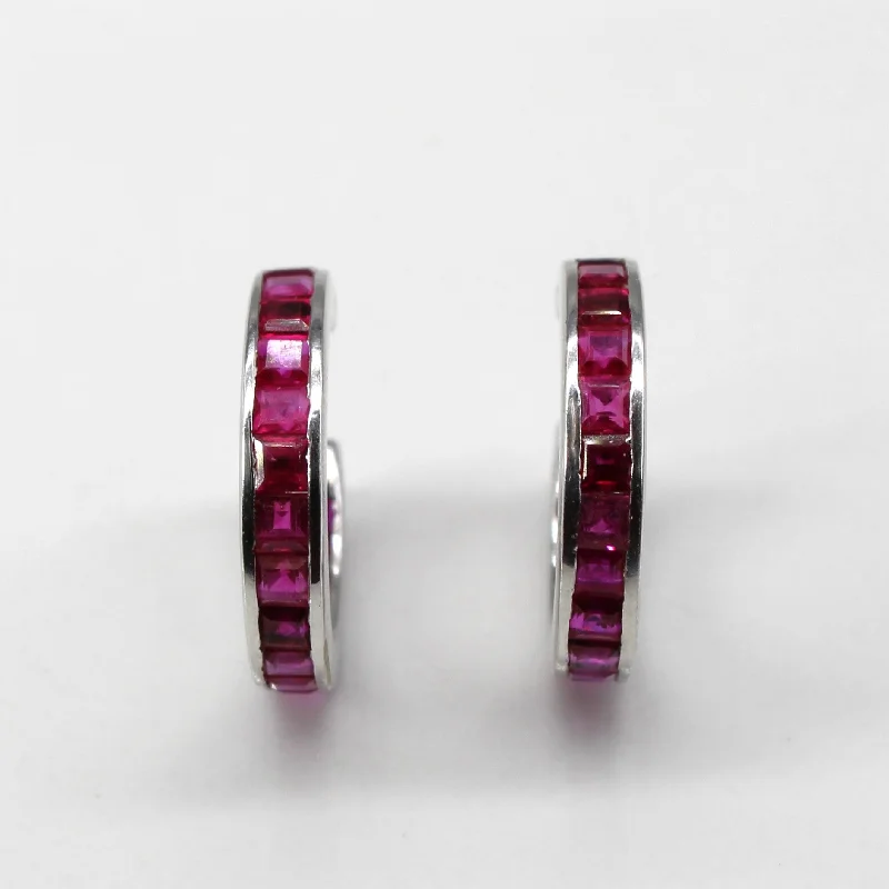 Hoop earrings with enamel stripes for a colorful and eye-catching design-Channel Set Ruby Huggie Earrings | 1.00ctw |