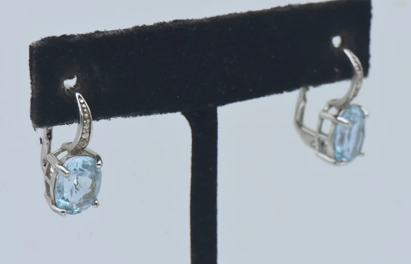 Hoop earrings with heart-shaped frames for a romantic and feminine look-Vintage Blue Topaz and Diamond Sterling Silver Earrings