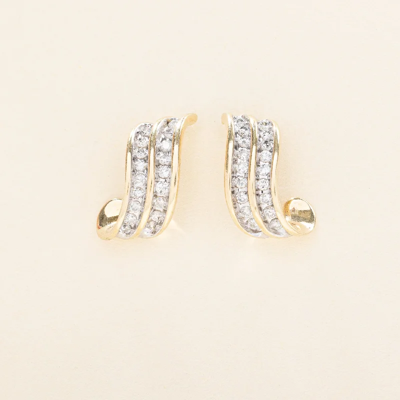 Hoop earrings with oversized designs for a bold, fashion-forward statement-Diamond Twist Earrings | 0.54ctw |