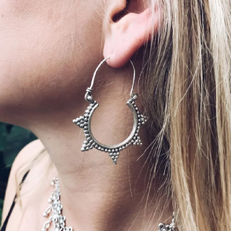 Best hoop earrings with butterfly motifs for a playful and whimsical appearance-Spike tribal hoop earrings